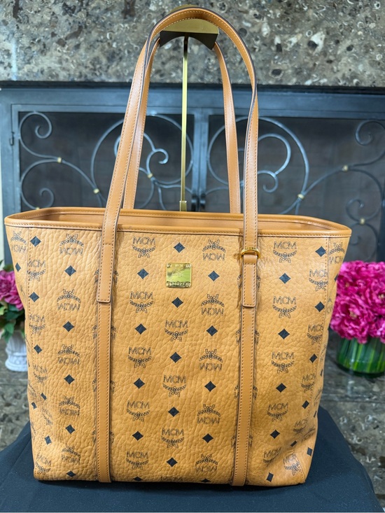 MCM Handbags - MCM Cognac Visetos Monogram Tote with Gold Plaque